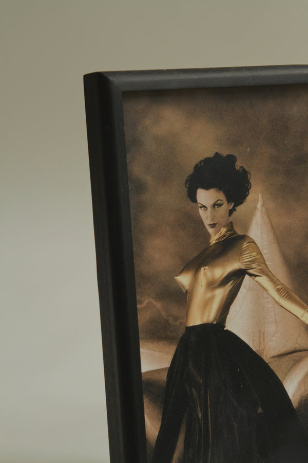 Photograph of Woman in Gold